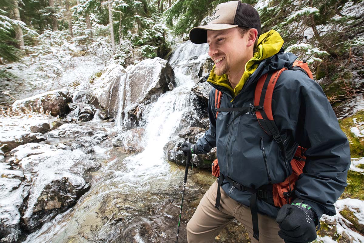 Smiling next to frozen waterfall (wearing Arc'teryx Beta AR hardshell jacket)